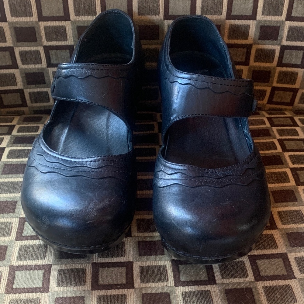 Dansko Black Strap Clog with designs.